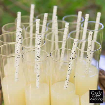 Birch Print Paper Straws in cups filled with lemonade.